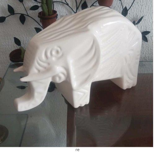 Elefante de porcelana branca